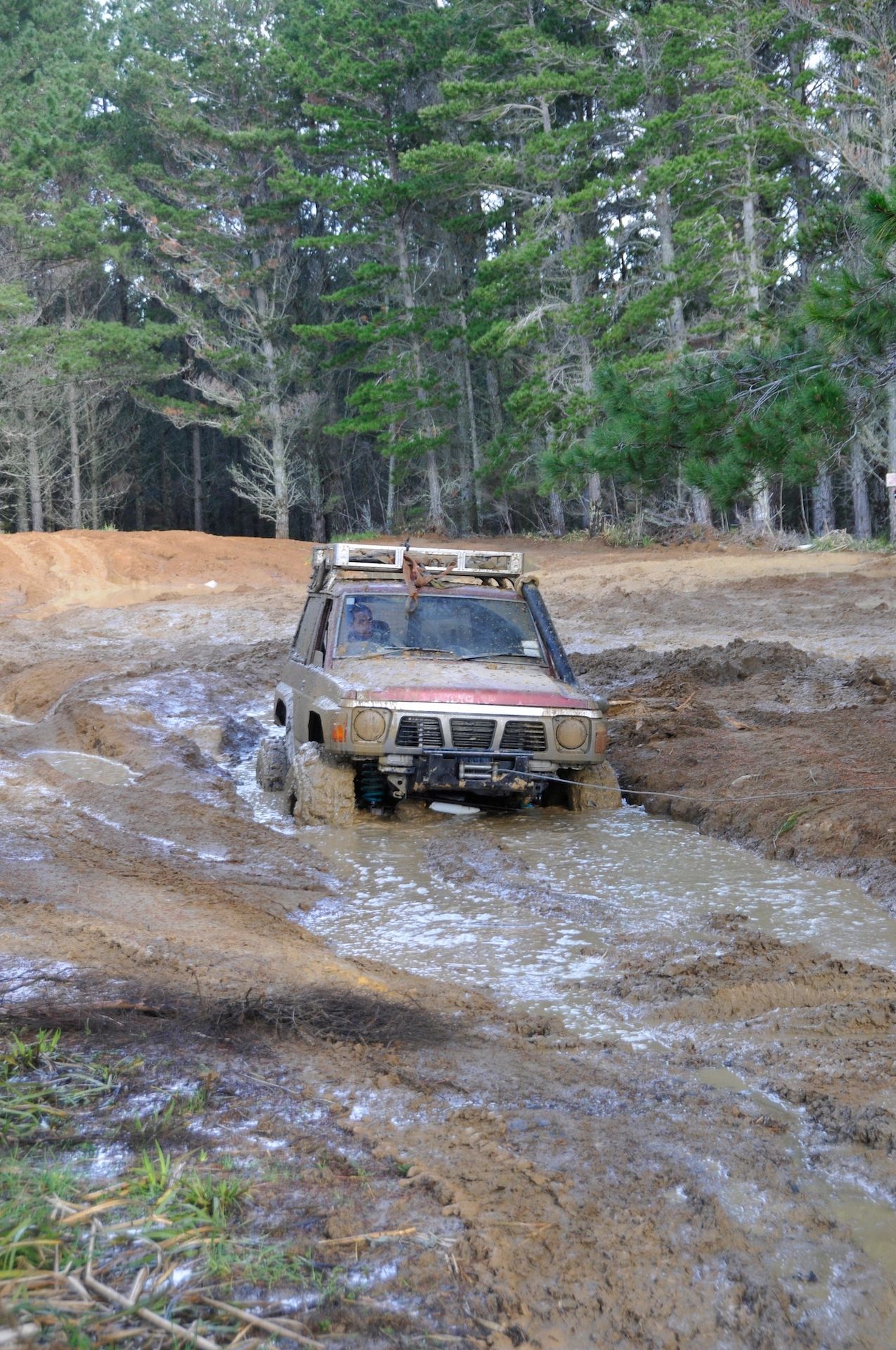 4WD in a deep muddy puddle